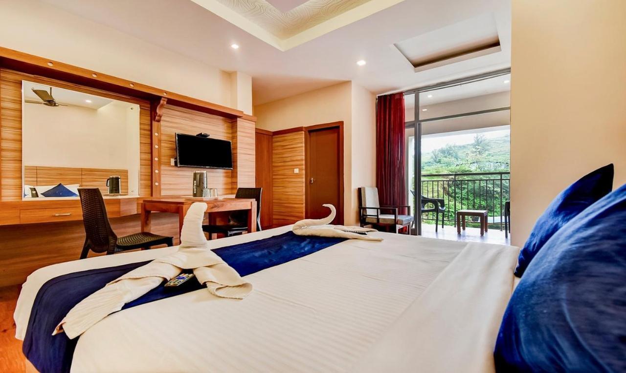 Hotel Fabexpress Luminos Dwelling Ikka Nagar à Munnar Extérieur photo